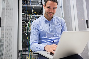a happy it professional installing a network for a brooklyn new york business