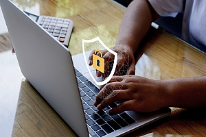 a man working on a secured computer