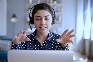 an employee working with virtual phone systems to call from anywhere