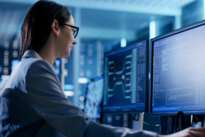 a managed IT services worker providing IT services at her computer in New Jersey