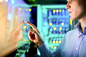 an outsourced it help desk professional working on it services