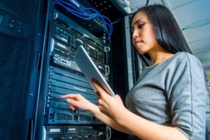 asian IT expert upgrading servers