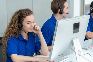 business people wearing headset working in office to support remote customer