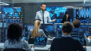 CMMC compliance consultant speaking to cybersecurity specialist
