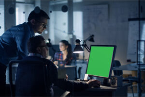 colleagues discuss on how the company can achieve IT security compliance