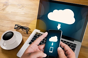 data backup and disaster recovery shown on a mobile phone and laptop screen in brooklyn new york