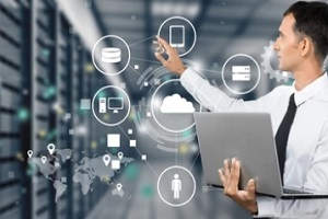 engineer with digital representation of company network