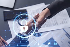 handshake of two businesswomen who enters into the contract to protect cyber security