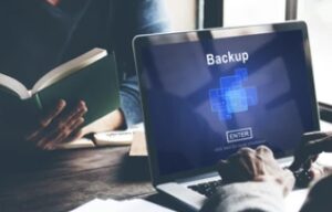 managed network services taking data backup using laptop