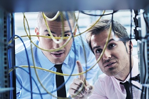 it professional helping a client with an it security services in Brooklyn ny