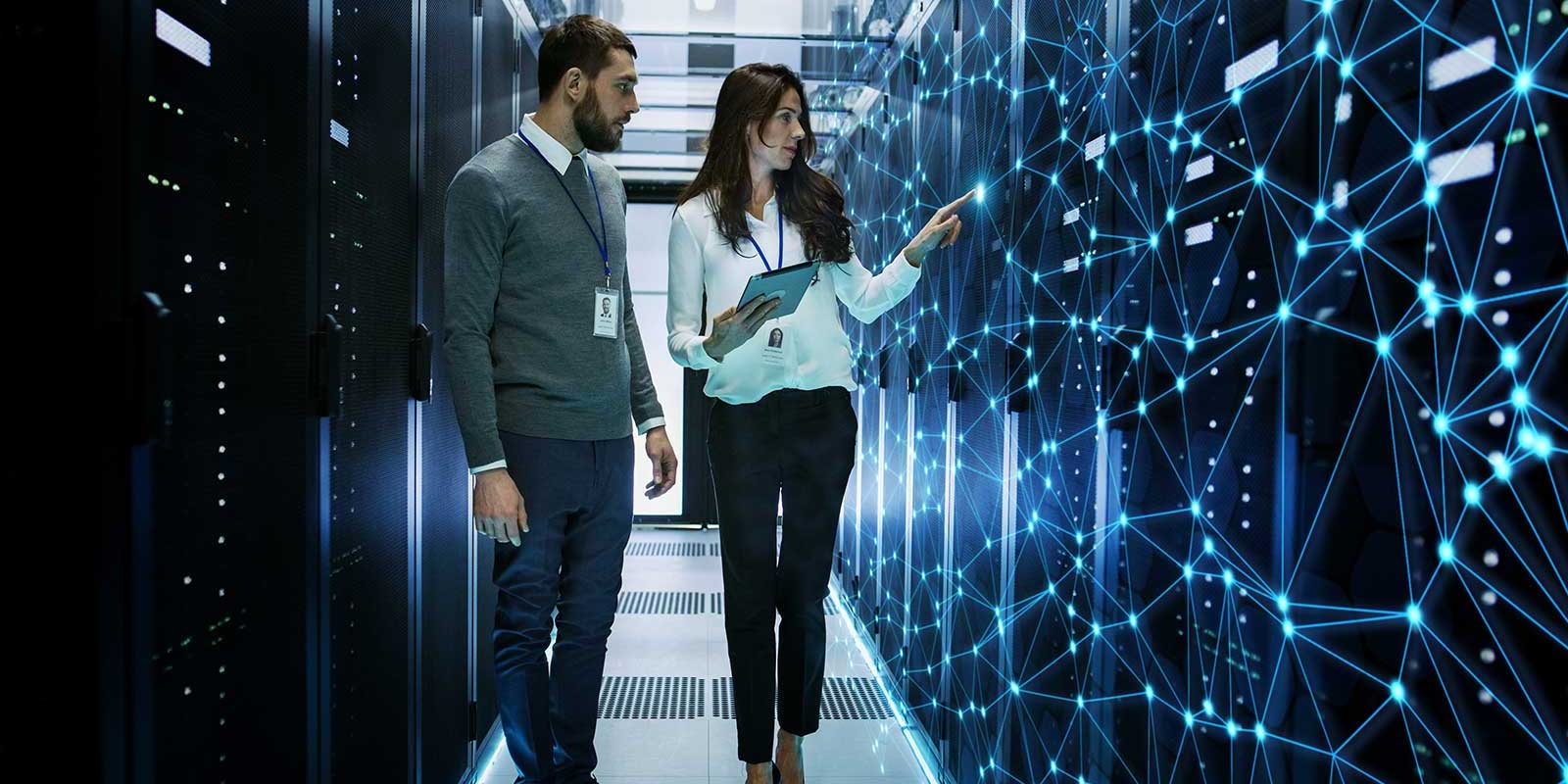 it security specialists in server room performing managed IT security services