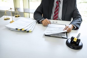male businessman working on getting his organization cmmc certification 
