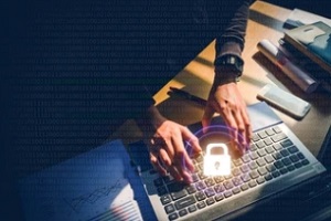man cyber security using laptop