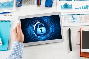 Man Holding Secured Tablet