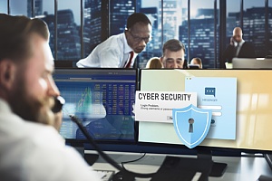 man on the phone in a cyber security office