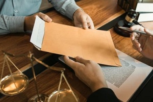 man submitting document