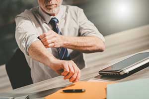 Man with CMMC compliance level 2 status