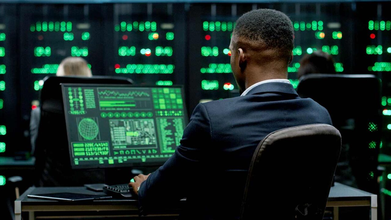 man wokring in a secret intelligence office