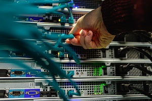man working in a data center