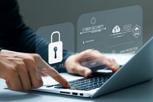 man working on laptop with cybersecurity concept