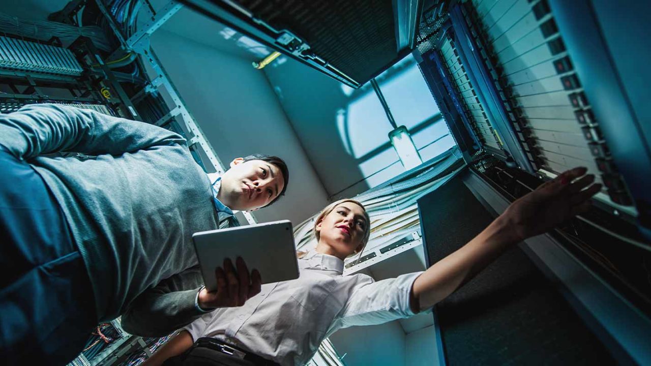 outsourced-team-of-man-and-woman-offering-it-services