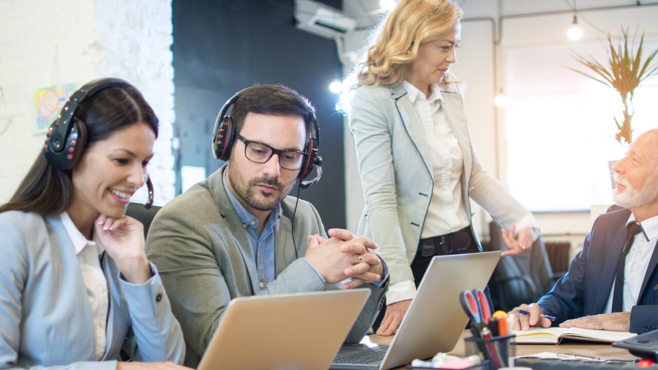 Questions to Ask Your Managed IT Service Provider- Business Persons Working Together