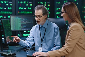 two cyber security employees identifying what CMMC level they need 