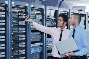 two network engineers checking servers