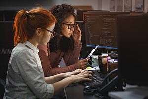 two women working for a cyber security agency