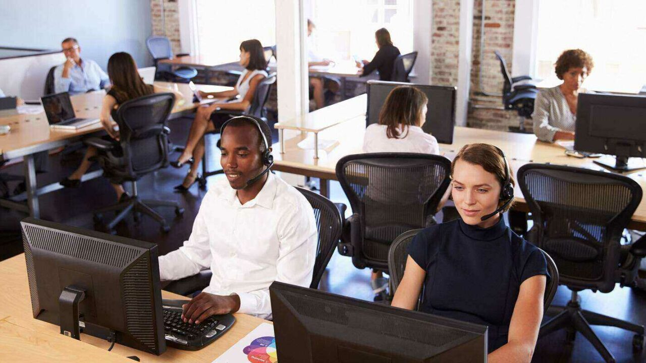 view of staff In busy managed it customer services department