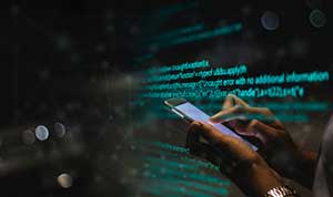 Woman performing cybersecurity threat detection