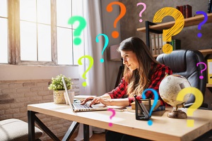 woman teleworker works at home with a laptop