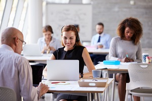 woman using laptop In customer service department
